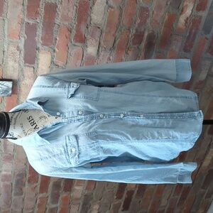 Light wash denim shirt.